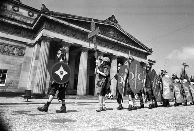 Edinburgh University students studying Classics dressed as Roman soldiers set off from the National Gallery for a route march along Hadrian's Wall to raise money for leukaemia research in June 1986.