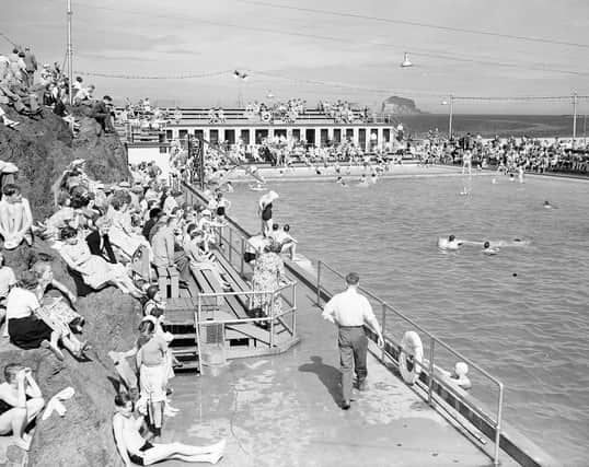 Holidaymakers at North Berwick open-air swimming pool in August 1953.