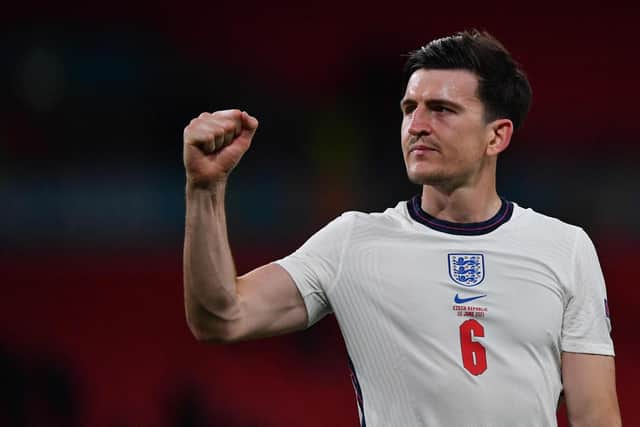 England defender Harry Maguire gestures to the crowd at the end of the UEFA EURO 2020 Group D football match between Czech Republic and England at Wembley. (Photo by JUSTIN TALLIS/POOL/AFP via Getty Images)