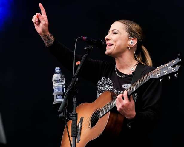 Sheffield X Factor singer Lucy Spraggan had told how an apology from Simon Cowell heaped her 'heal'. Lucy is pictured playing the Tramlines main stage