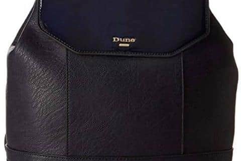 A black Dune bag was stolen by armed men who burst into a house in Hillsborough