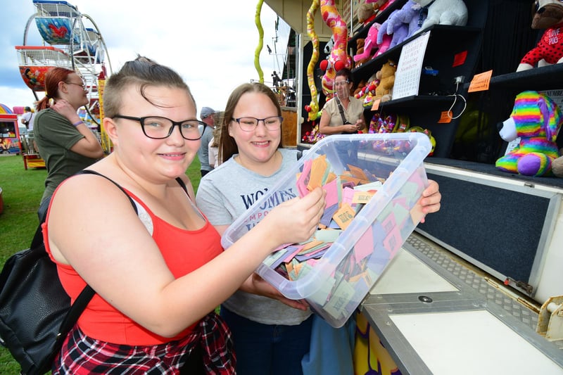 Eleanor Timney (17) with her sister Abigail feeling lucky on the tombola.