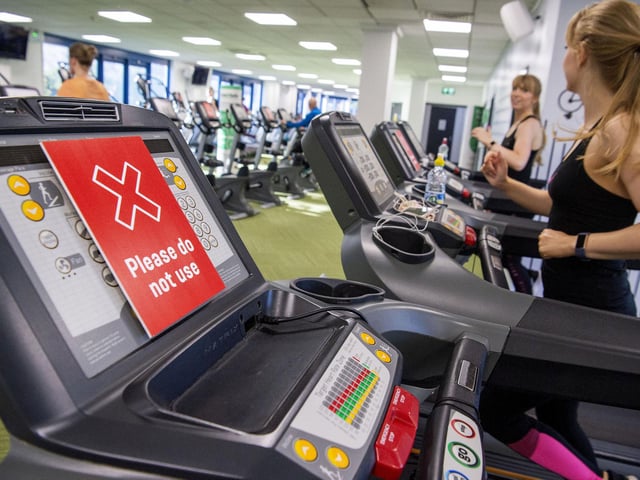 Alternate treadmills have been marked to prevent members getting to close to one another while running.