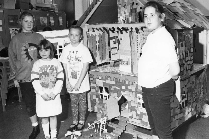 These keen youngsters were building a giant dolls' house at the town's museum.  Left to right are:  Jacqueline Newman, Jill Tubbritt, Tracy Rossiter and Helen Newman.
