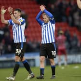 Sheffield Wednesday defender Jordan Storey (left) has enjoyed the challenge of playing for the club.