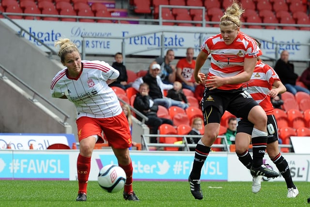 Millie Bright has a shot on goal against Liverpool whilst playing for Doncaster Belles.