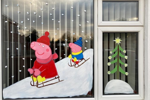 Peppa Pig in the window from Rebecca L Burns.