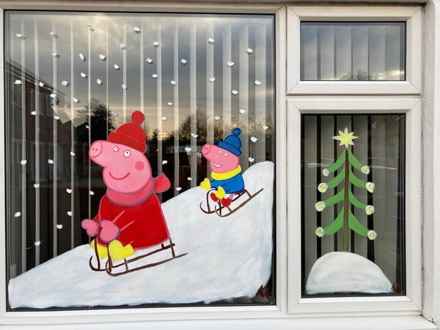 Peppa Pig in the window from Rebecca L Burns.