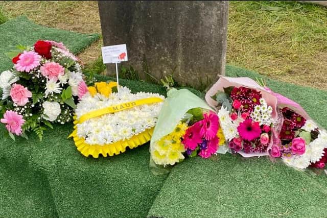 A woman’s body has been re-buried today after police had to exhume it as part of an investigation into the disturbance of a grave at Carlton Cemetery, Barnsley
