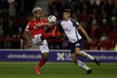 Lyle Taylor of Nottingham Forest controls the ball as Jordan Storey of Preston North End competes for the ball during the Sky Bet Championship match between Nottingham Forest and Preston North End at City Ground on November 06, 2021 in Nottingham, England. (Photo by Ashley Allen/Getty Images)