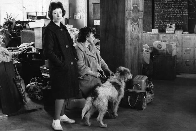 Homeless Mrs E Hallam of Errington Avenue, Arbourthorne and her 15-year old daughter Pamela, with their dog Rover, find refuge for themselves and their belongings at Hurlfield Boys’ School after the hurricane that hit Sheffield on February 16, 1962
