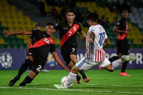 Peruvian midfielder Yuriel Celi (centre) has been linked with Sheffield United (Photo by JUAN BARRETO/AFP via Getty Images).