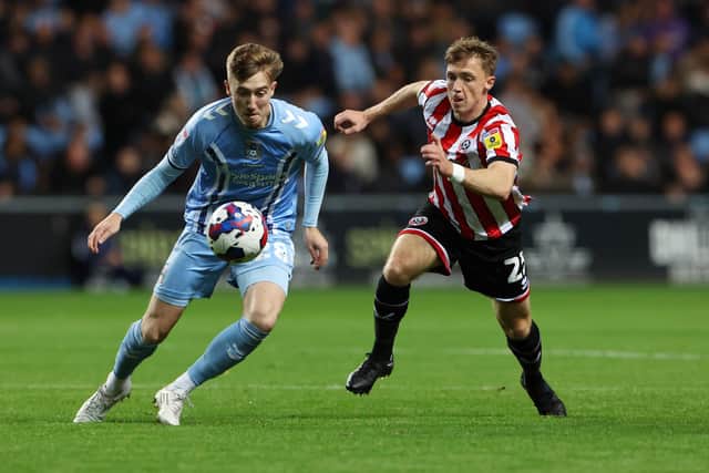 Josh Eccles of Coventry City battles for possession with Ben Osborn of Sheffield United when the two clubs met at the CBS Arena earlier this season: Catherine Ivill/Getty Images