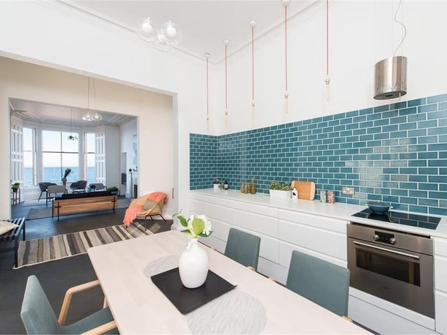 The kitchen and living room have been opened up to create light filled space.