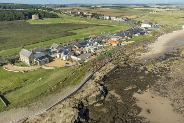An aerial view of the property shows its proximity to the coast.