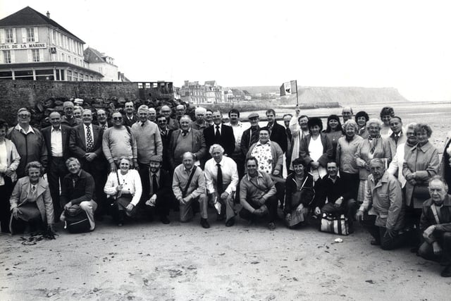 Members of The Star readers club pictured on the beach at Arromanches, Normandy, during a D-Day landings tour in 1984