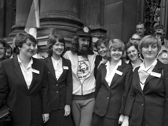 Scottish entertainer Billy Connolly leaves Glasgow on a sponsored cycle ride to Inverness in August 1980. Billy with some of the girls from the Ellerman Travel company.