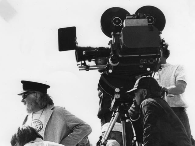Director Ken Russell with the camera during the filming Tommy at South Parade Pier
