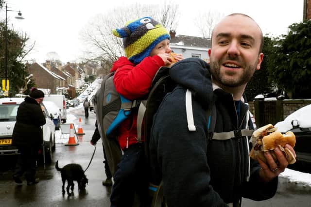 Rob Charles and son Arthur (3) enjoy urgers in Nether Edge near the proposed new low-traffic neighbourhood