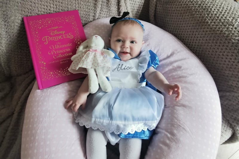 Holly McGuinness 5 months celebrating world book day with her favourite Disney princesses
