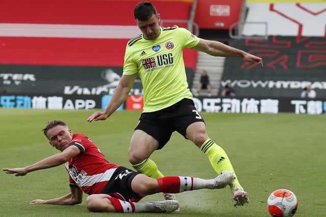 Enda Stevens of Sheffield United is tackled by Will Smallbone of Southampton: Simon Bellis/Sportimage