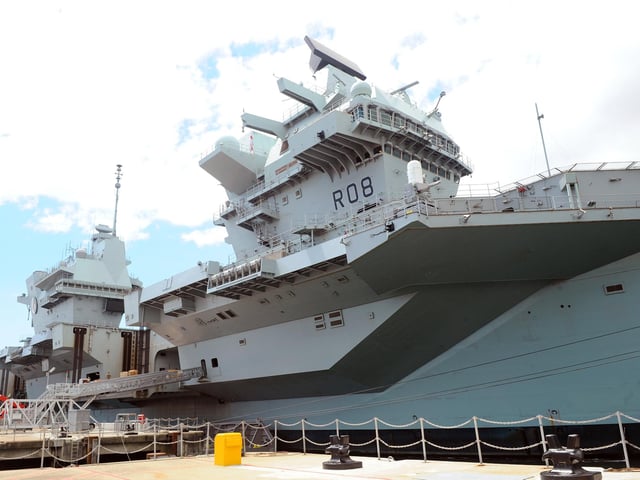 Britain's biggest warship HMS Queen Elizabeth pictured returning to Portsmouth after 10 weeks at sea, carrying out critical training. Picture: (020720-935)