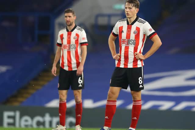 Sander Berge (R) and Chris Basham are not receiving the benefit of trying to play the game the right way, Sheffield United manager Chris Wilder has admitted David Klein/Sportimage