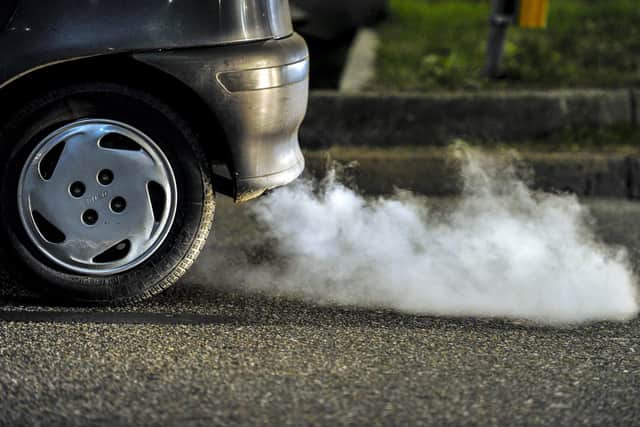 Car belching out exhaust fumes. Only seven percent of Sheffield Council’s vehicle fleet is electric and it might have to charge its own heavily polluting vehicles in its Clean Air Zone.