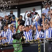 We asked Sheffield Wednesday fans in Sheffield city centre who they would like to see given the manager's job. This file picture shows the Owls pair of Liam Palmer and Barry Bannan lift the Play off Final trophy   Pic Steve Ellis