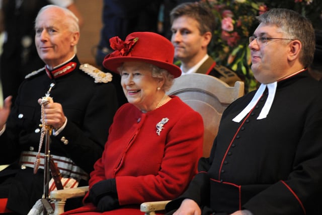 Her Majesty the Queen listening to children singing during her visit to Sheffield Cathedral , November 18, 2010