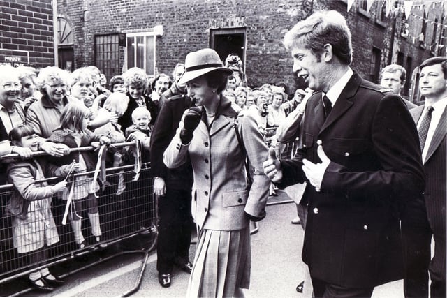 This photo from September 30, 1985 shows Princess Anne finding something amusing as she visits the Unity Centre, off Arundel Gate, in Sheffield city centre.