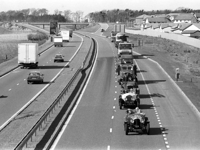 Vintage cars on the Edinburgh City Bypass road (A720) at its official opening in March 1990.