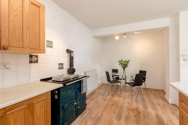 This is one of two kitchens that the property boasts, with the rayburn oven included in the sale of the flat