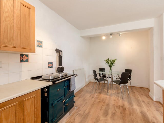 This is one of two kitchens that the property boasts, with the rayburn oven included in the sale of the flat