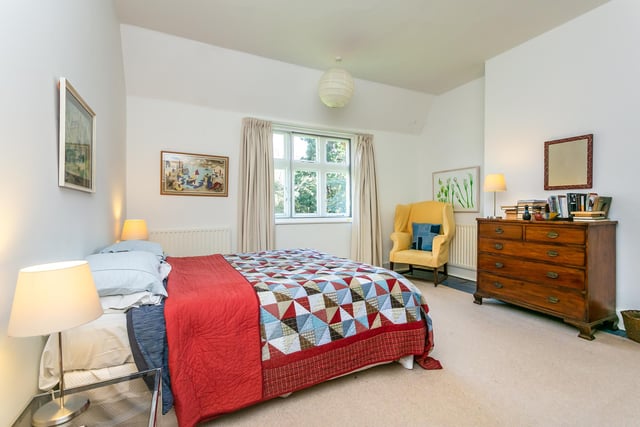 There are six good-sized bedrooms throughout the property in total, including this master room which offers plenty of storage space and has a modern feel thanks to the neutral decor.