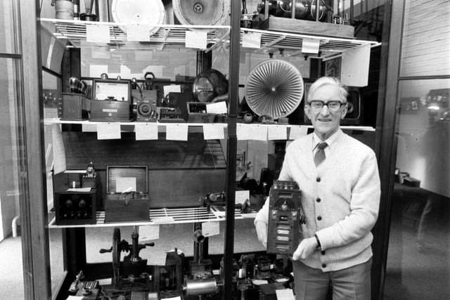 Harry Matthews, founder of the Edinburgh University Museum of Telecommunication at King's Buildings with part of the collection in March 1983.