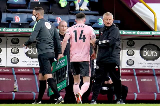 Sheffield United manager Chris Wilder (right) pats Sheffield United's Oliver Burke on the back after he is substituted for teammate Billy Sharp during the Carabao Cup second round match at Turf Moor, Burnley: Jon Super/NMC Pool/PA Wire.