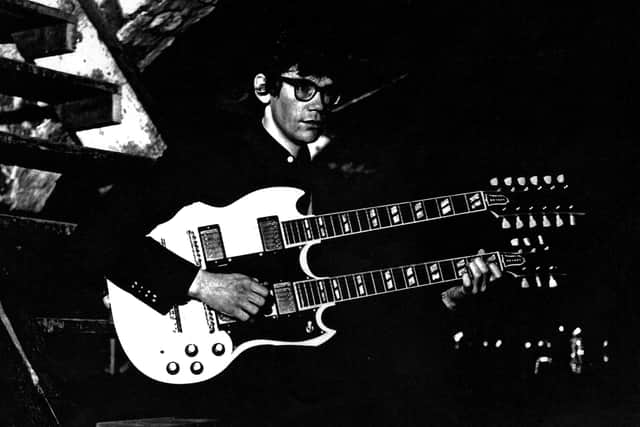 Frank White with his twin-neck guitar at Club 60