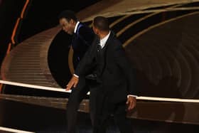 Will Smith appears to slap Chris Rock onstage during the 94th Annual Academy Awards at Dolby Theatre on March 27, 2022 in Hollywood, California. (Photo by Neilson Barnard/Getty Images)