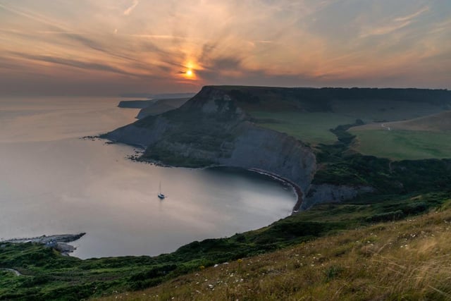 Chapman’s Pool sits is backed by high cliffs and offers superb views. Down in the cove there’s a couple of fisherman’s huts and a slipway (Photo: Shutterstock)