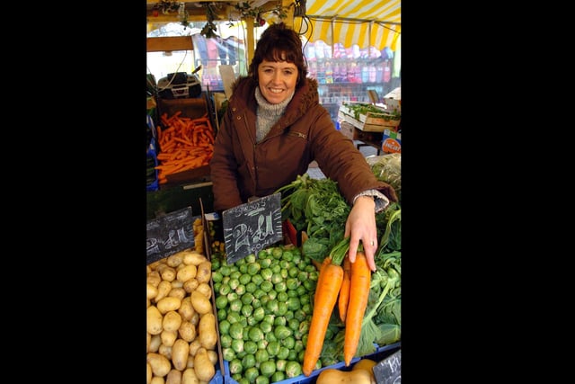 2007. Market traders now placed in Commercial Road Portsmouth. 
Ann Goodman (51) with beautiful, fresh carrots in January. Picture: Malcolm Wells (070151-132)