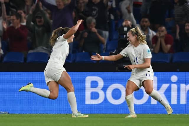 England's midfielder Georgia Stanway (L) celebrates scoring her team's second goal during the UEFA Women's Euro 2022 quarter final football match between England and Spain at the Brighton & Hove Community Stadium, in Brighton, southern England on July 20, 2022. (Photo by Glyn KIRK / AFP)