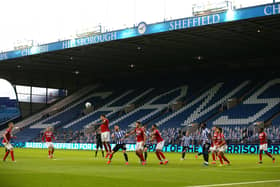 Sheffield Wednesday in action against Middlesbrough against a backdrop of empty seats at Hillsborough Stadium