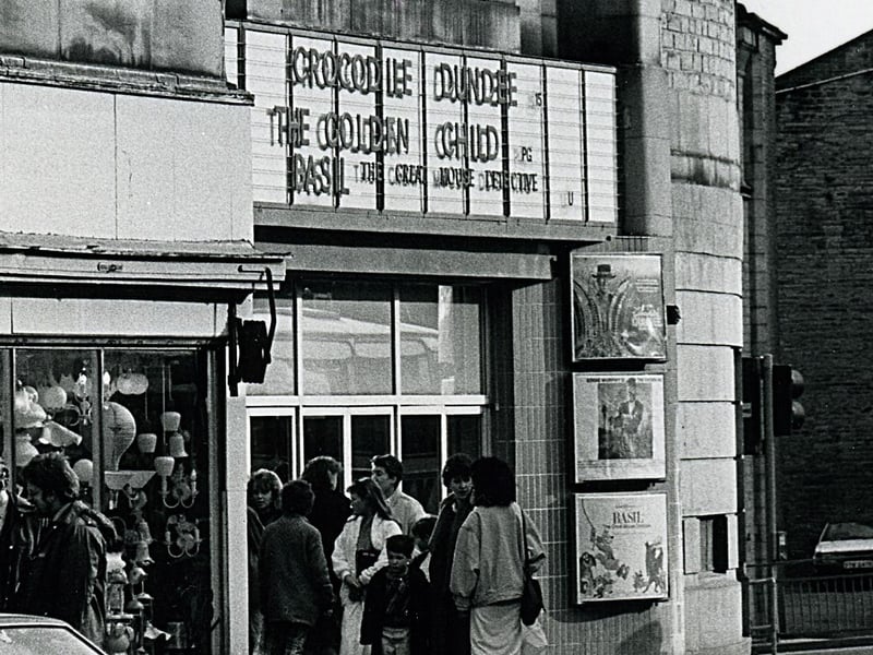 The ABC cinema, Wards End, Halifax in around 1987, showing 'Crocodile Dundee', 'The Golden Child' and 'Basil, The Great Mouse Detective'