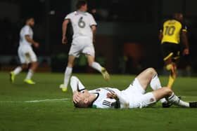 Sheffield United's Paul Coutts lies injured after a serious leg injury during the Sky Bet Championship match against Burton Albion at The Pirelli Stadium, Burton: Mike Egerton/PA Wire.