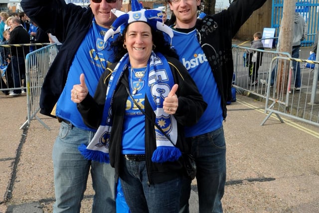Michelle Taylor with husband Fred and her son Karl get ready to board their buses for Wembley at Fratton Park.