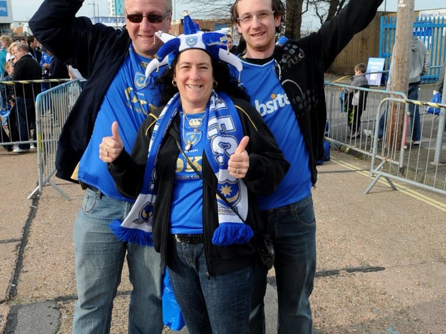 Michelle Taylor with husband Fred and her son Karl get ready to board their buses for Wembley at Fratton Park.