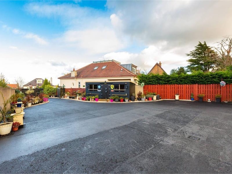 The site also has a separate large Scandinavian timber shed and a gated private access road which has a monoblocked entrance.