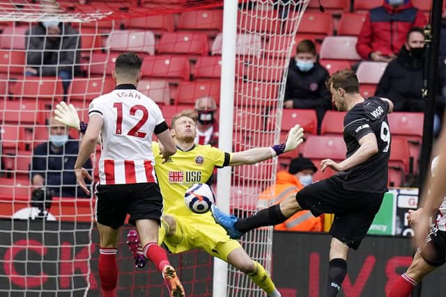 Sheffield, England, 23rd May 2021. Aaron Ramsdale of Sheffield Utd saves from Chris Wood of Burnley during the Premier League match at Bramall Lane, Sheffield. Picture credit should read: Andrew Yates / Sportimage