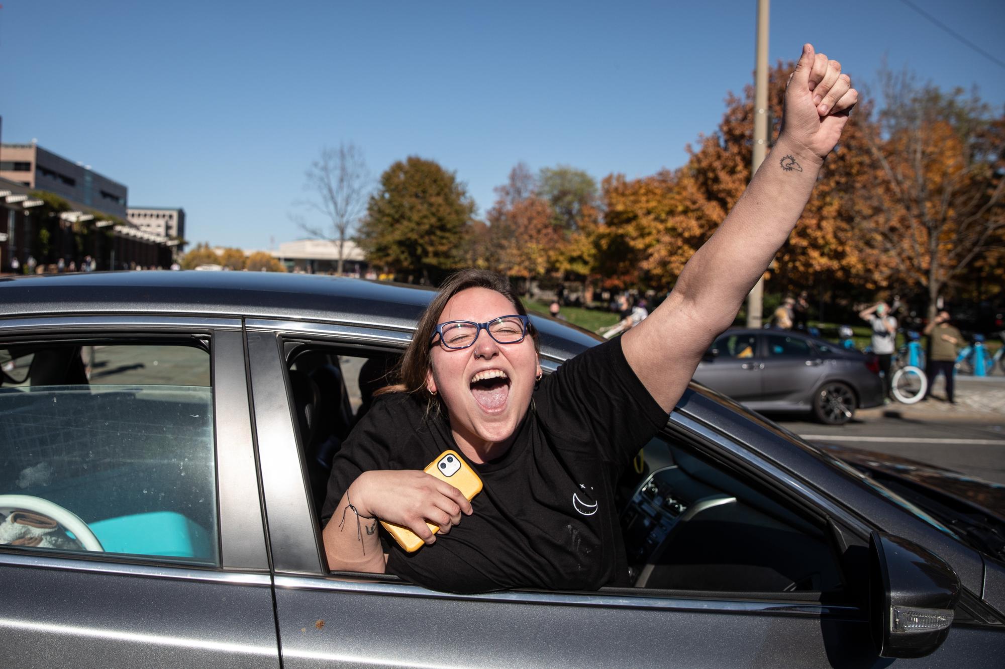 People celebrate from their cars  in Philadelphia, Pennsylvania.  (Photo by Chris McGrath/Getty Images)